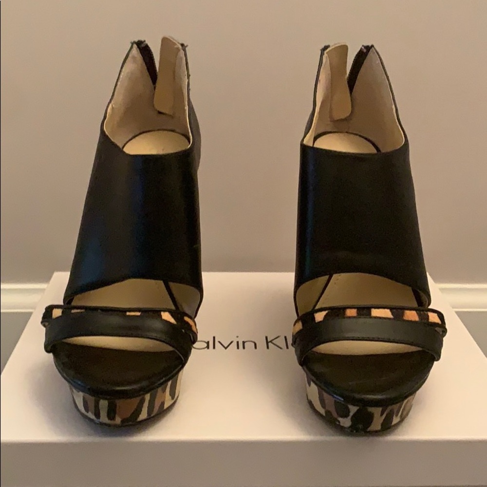 Calvin Klein platform open toe booties.